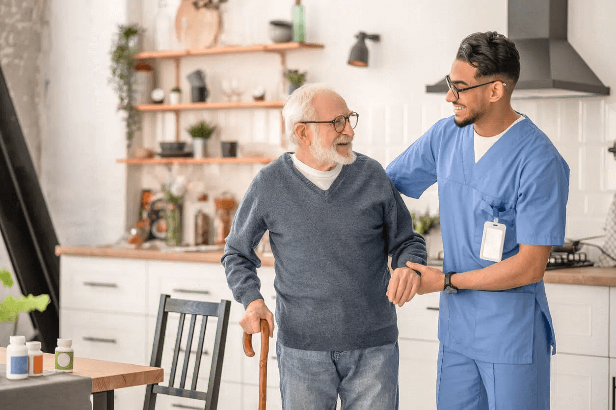 Caregiver providing medication reminders to senior client
